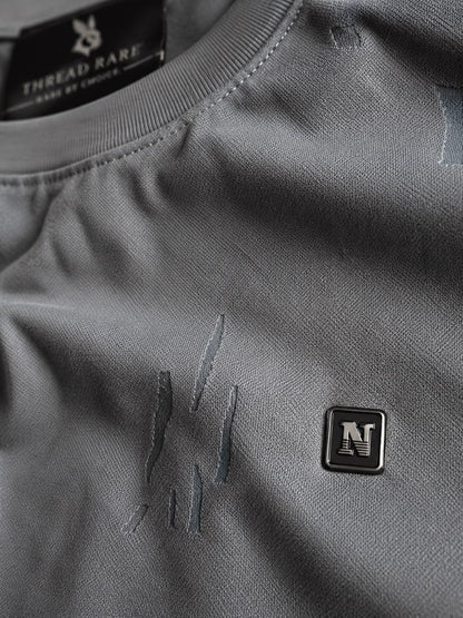 THREAD RARE – Distressed Brasso Knit Oversized T-Shirt